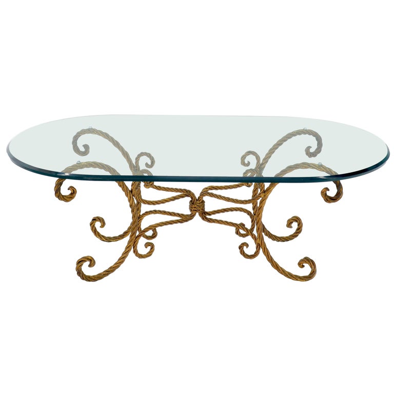 oval wrought iron coffee table with glass top