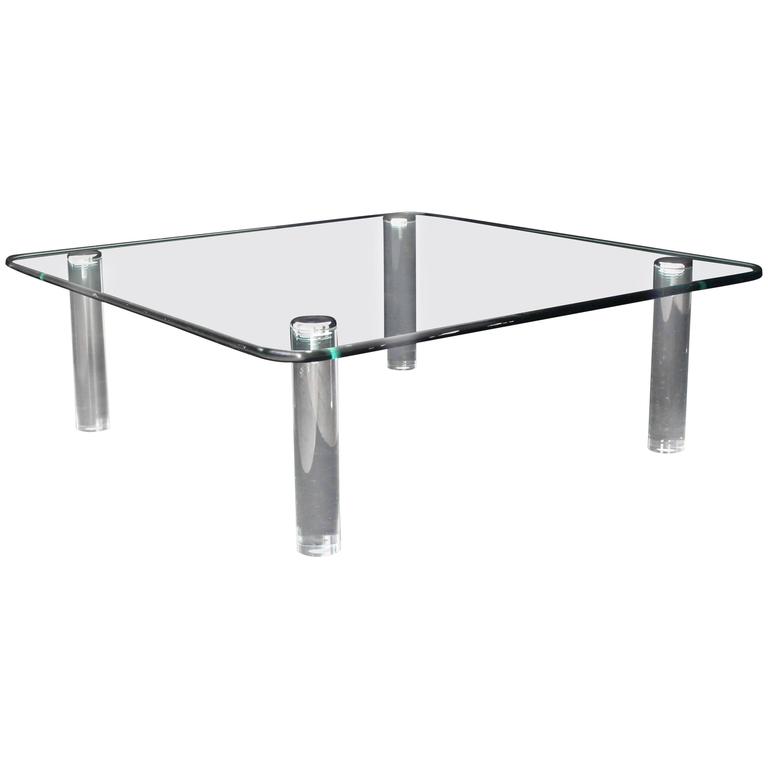Coffee Table On Cylinder Lucite Legs, Rounded Edge Glass Coffee Table